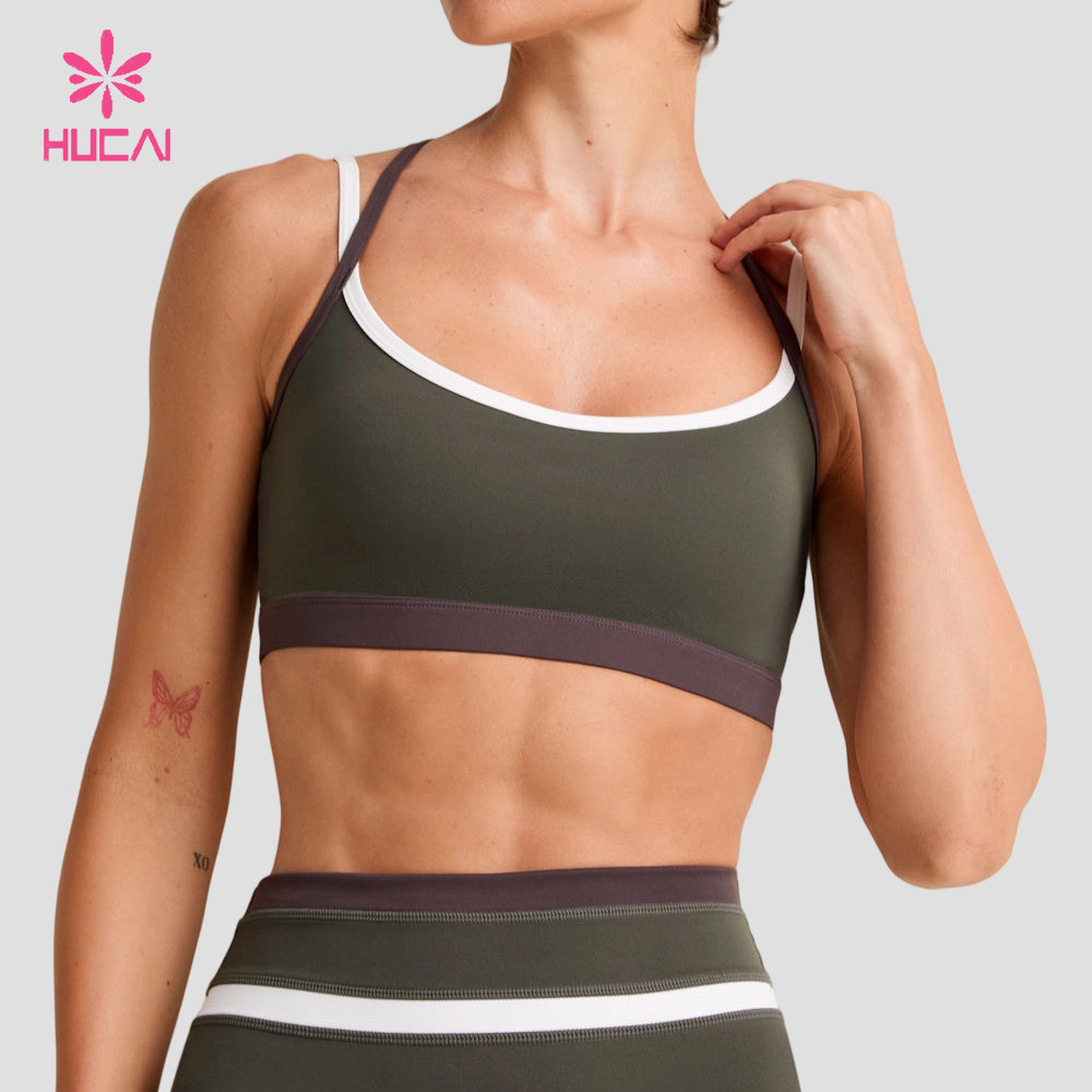 Custom olive sports bra with mauve contrast band showing the same strap construction