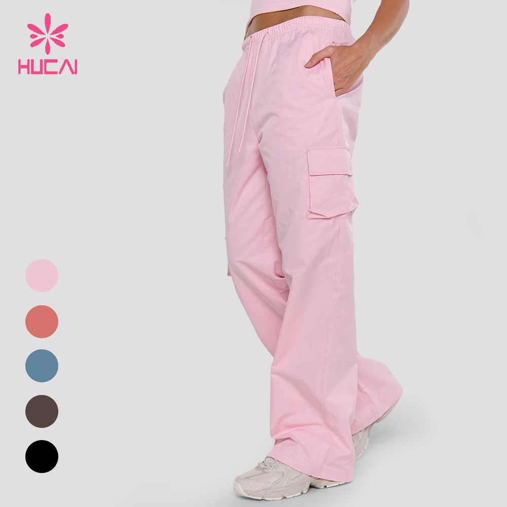 Side view of the sweetheart pink cargo sweatpant with a thigh flap pocket
