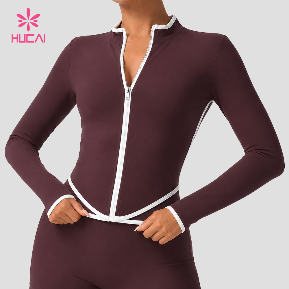 Front view showing the curved white contrast hem band crossing at the centre front