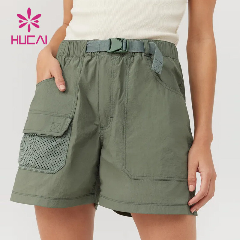 Women's woven utility shorts with mesh cargo pocket and adjustable waist belt, flat woven shell construction
