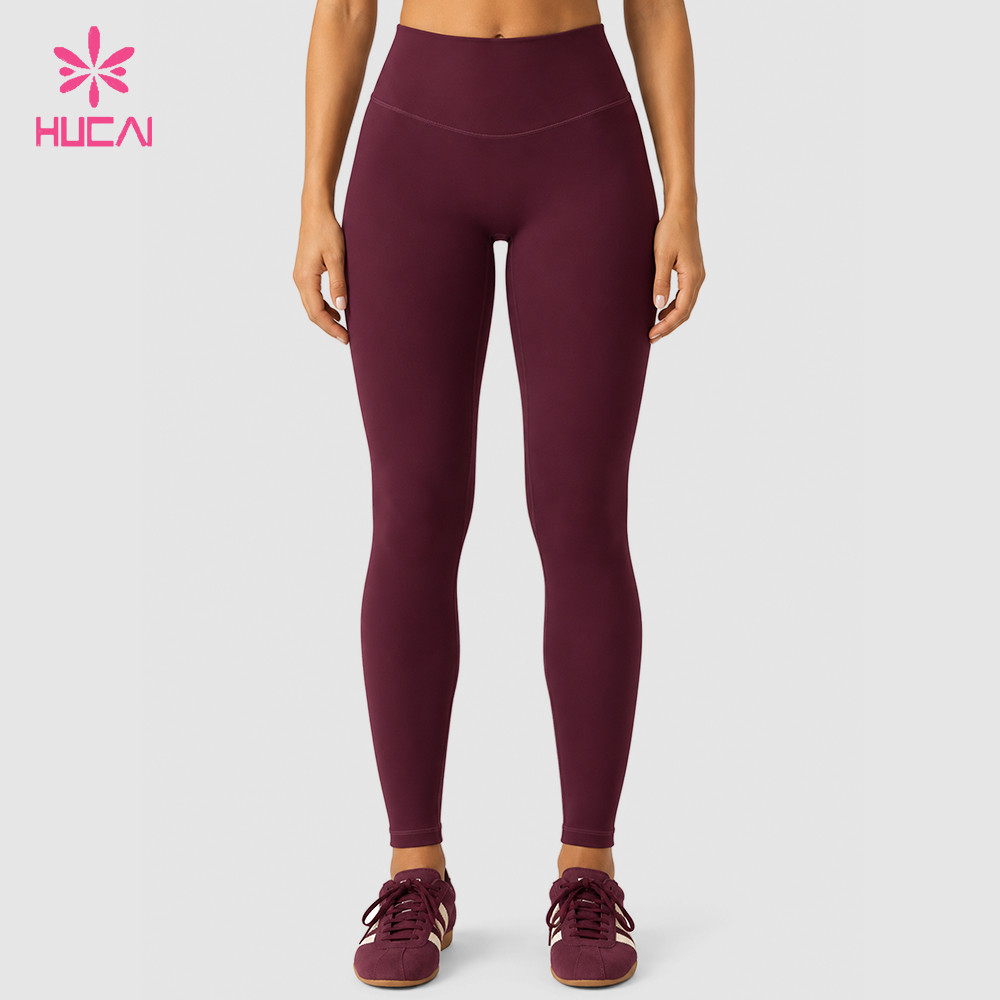 Custom burgundy full length high rise leggings front view on model