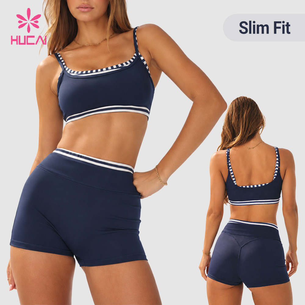 Custom navy sports bra and shorts set in slim fit, front and back views