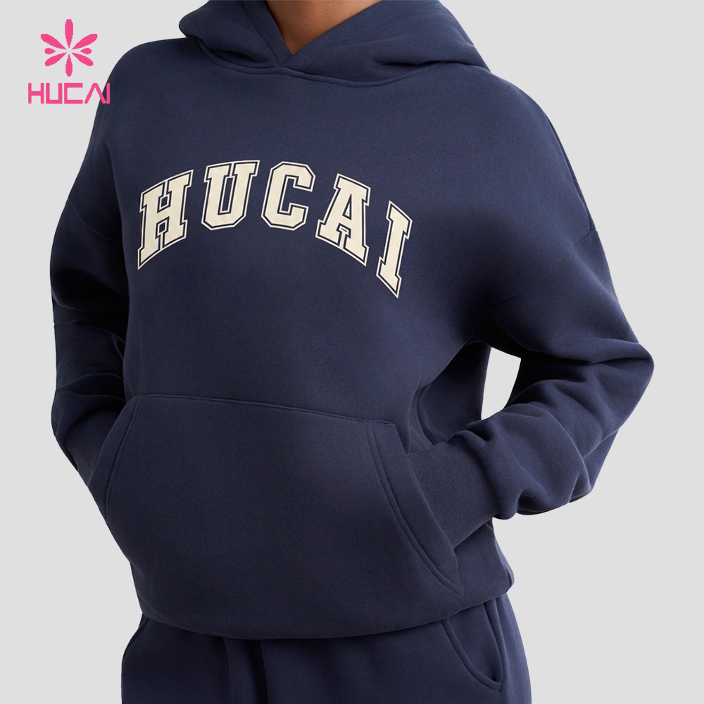 Navy oversized pullover hoodie with contrast applique lettering on the chest