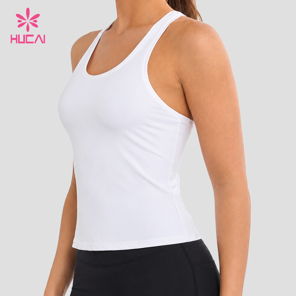 Women's racerback tank top in white, front view