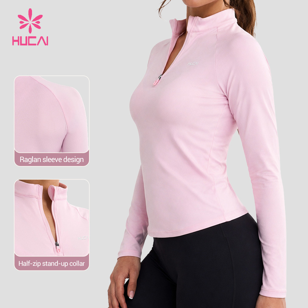 Half zip stand-up collar and raglan sleeve callouts on the reference sample