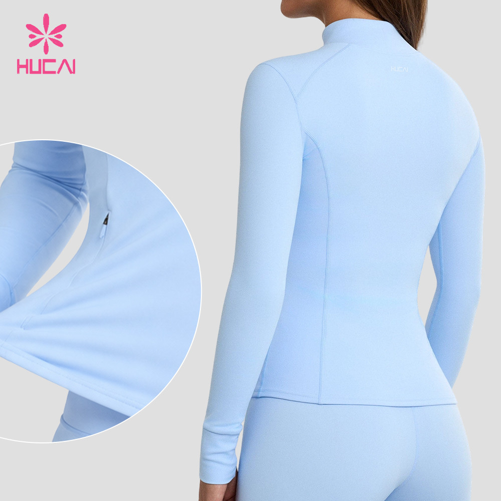 Back view of the fitted full zip jacket in sky blue