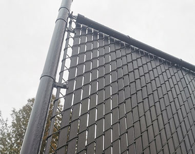 Boardway pvc fence slats on the chain link