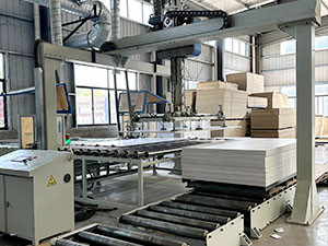 Production of laminated PVC board