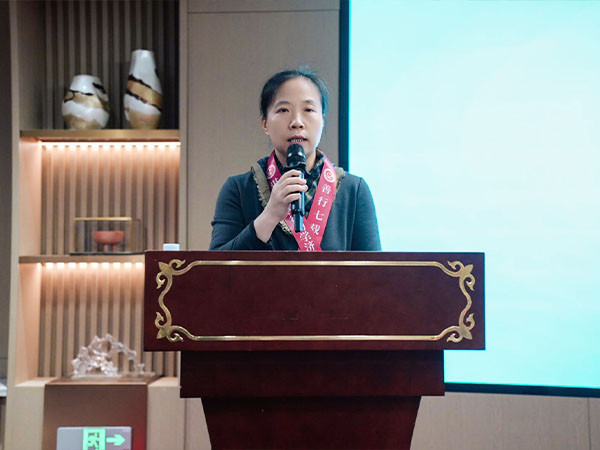 Ms. Li attending the charity association anniversary event