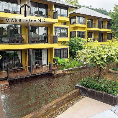 Custom designed brown glass mosaic tile for apartment outdoor pool