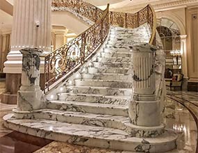 Marble staircase brass handrail