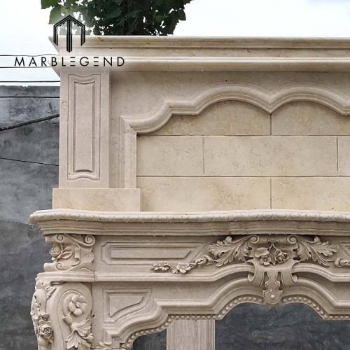 hand carved antique double Crema Marfil marble fireplace surround for indoor decor