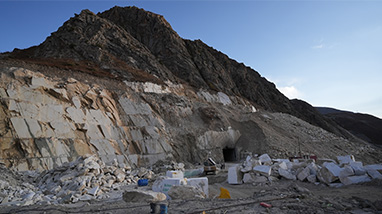 Snow-covered peaks of the Pamir range around the Tasso White quarry