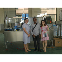 our Nigerian client checking 12000 bottles per hour wine filling line