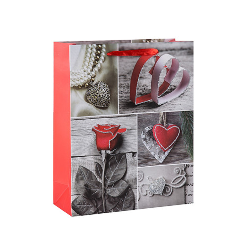 Bolsas de regalo de papel para el día de los enamorados de hearfelt con 4 diseños surtidos en Tongle Packing