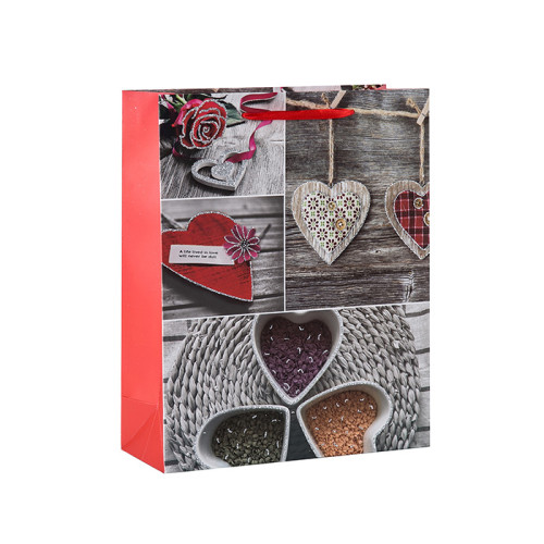 Bolsas de regalo de papel para el día de los enamorados de hearfelt con 4 diseños surtidos en Tongle Packing