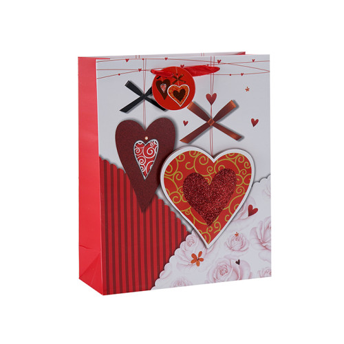 Corazón tocando feliz día de San Valentín 3D y bolsas de regalo brillo con 4 diseños surtidos en Tongle Packing