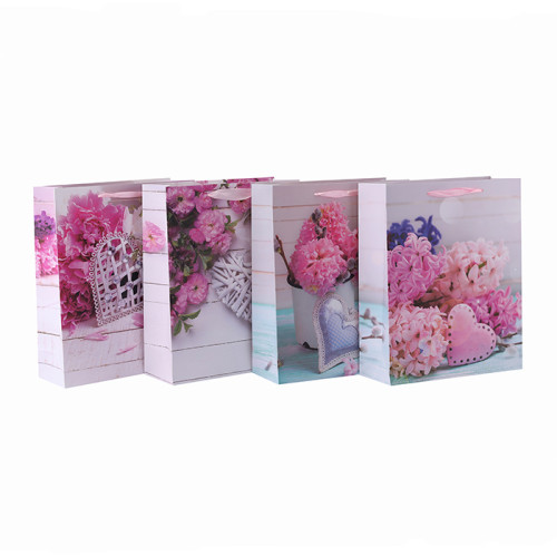 カスタム花柄のパターンのマットリボンハンドル紙のギフト包装袋は、4つのデザインTongleパッキングで盛り合わせ