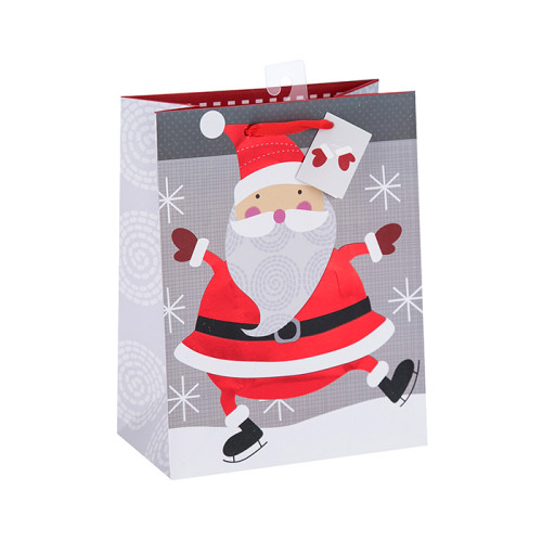 La bolsa de papel impresa de las artesanías del nuevo diseño de la Navidad con diverso tamaño con 2 diseños clasificados en embalaje de la llave