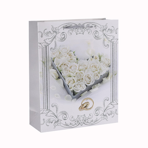 Estampado de flores impreso personalizado Varios tamaños Bolsa de regalo de papel con 4 diseños surtidos en embalaje de la llave
