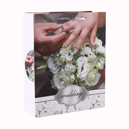 白の段ボールの花ロマンチックなスタイルキラキラギフト紙袋4つのデザインとトングパッキングで盛り合わせ