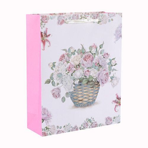 Bolsa de regalo de papel con mango de cinta blanca y diseño de flores de cartón blanco con 4 diseños surtidos en embalaje de llave