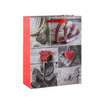 A hear felt Valentine's Day paper gift bags with 4 designs assorted