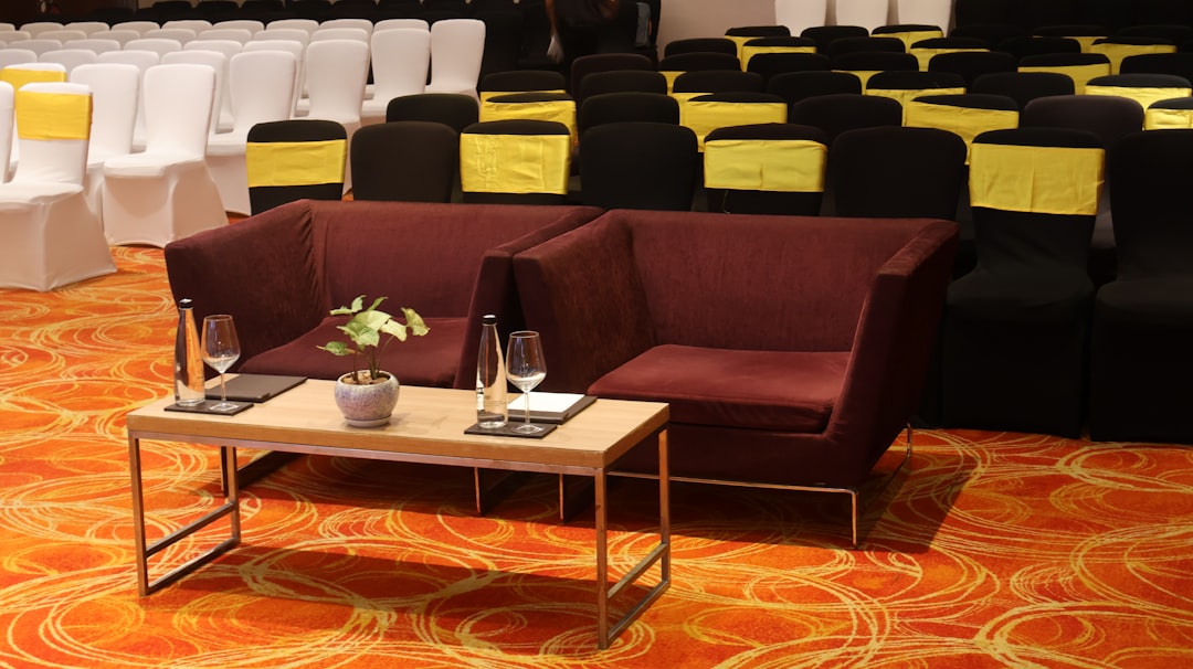 Sleek, compact line array system setup for a professional corporate conference in a ballroom