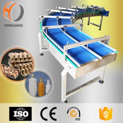 Curve conveyor system with modular belt for packing machine