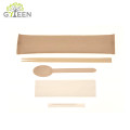Palillos de bambú desechables y cuchara de madera con bolsa de papel