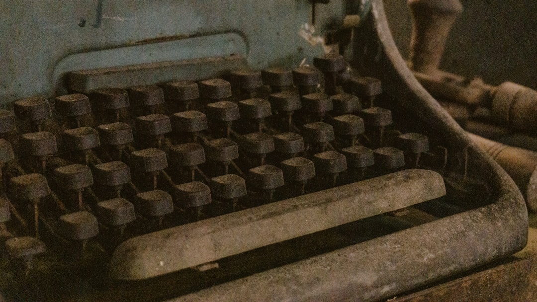 Image of an aluminum roll forming machine in operation, showcasing the metal coil feeding into the rollers.