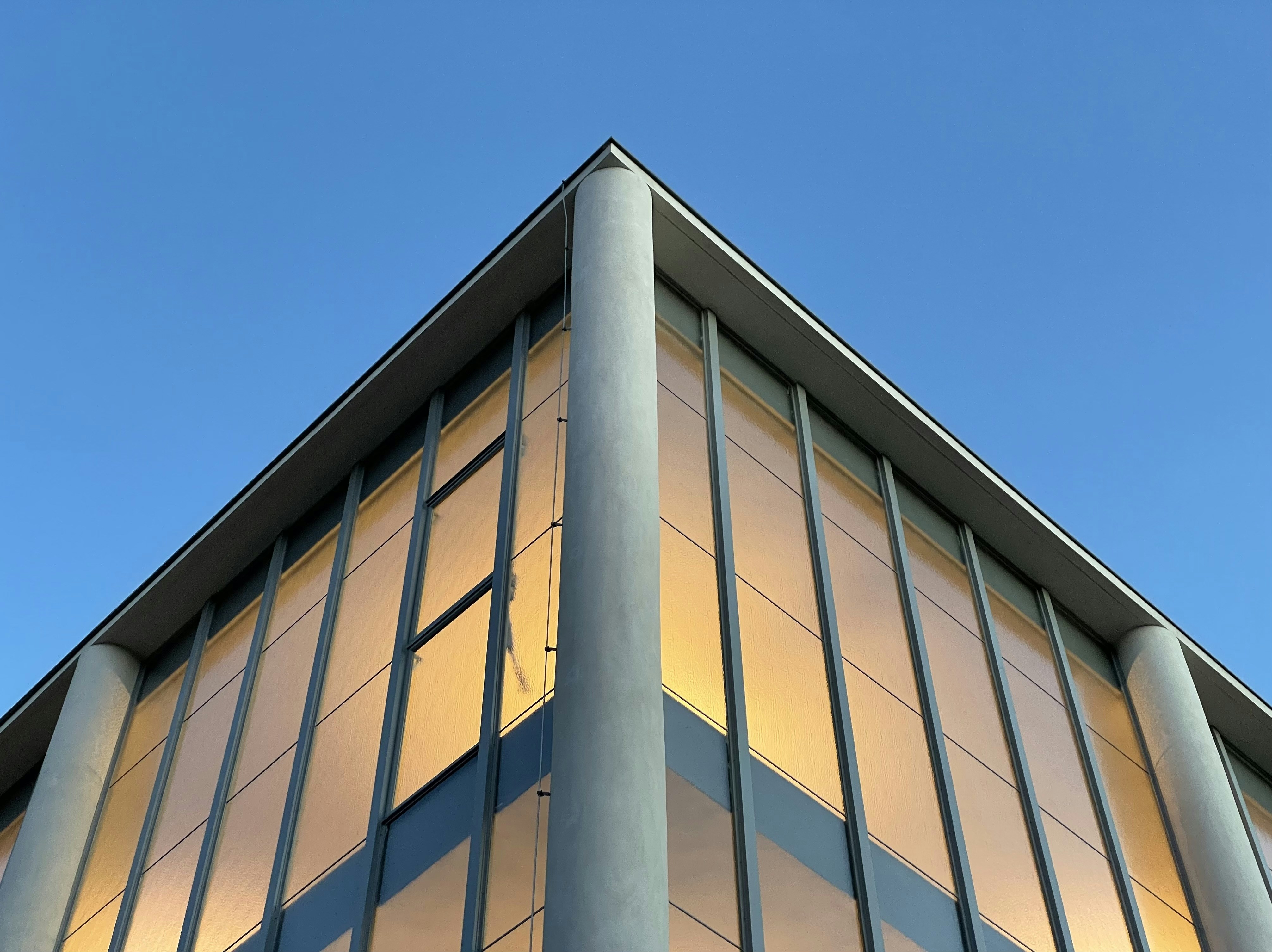 An image showcasing the durable and weather-resistant steel exterior of a building constructed with insulated metal panels.