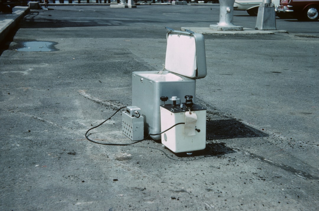 Portable standing seam machine on a trailer at a job site