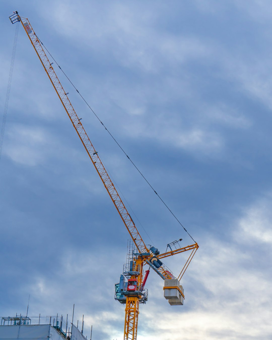 Portable standing seam machine at a construction site