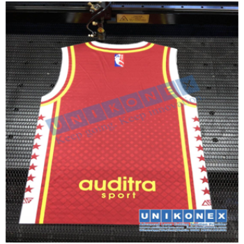 Laser cutting in dye sublimation printed sports jersey by Unikonex
