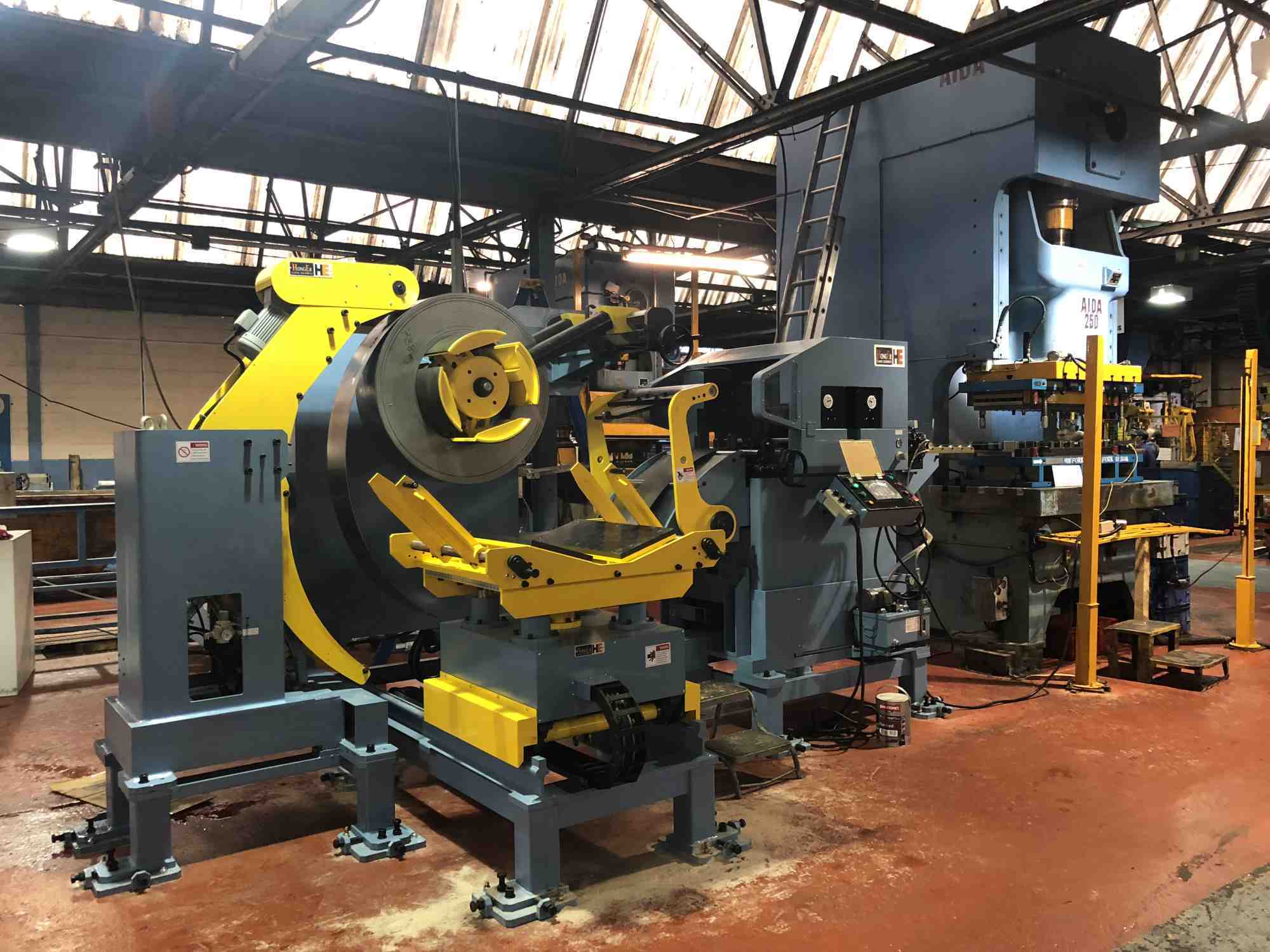 Decoiler Straightener Feeder Machine Equipped With AIDA Press Machine in UK Workshop For Auto Parts Stamping