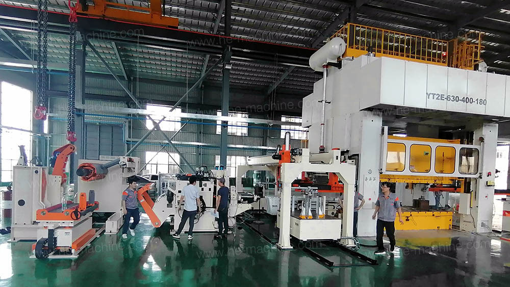 A-compound-coil-feed-line-for-both-transfer-die-and-progressive-die-image