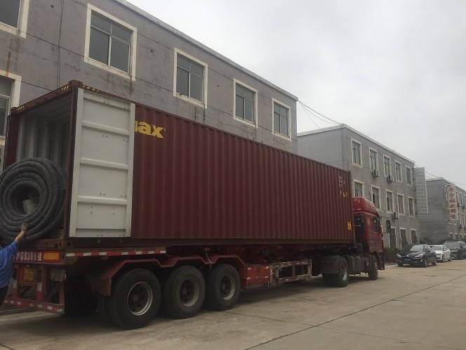 Two containers of plastic corrugated pipe machine line are packaged to Egypt