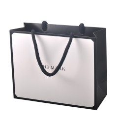 Luxury coated paper shopping bag packaging with cotton inserted handle and matt lamination