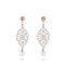 White mineral dust filigree stainless steel rose gold dangles earrings