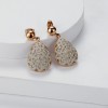 White mineral dust filigree stainless steel chandeliers earrings