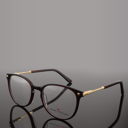 Top venta nuevos diseños de lujo de moda moderna para hombre gafas redondas Montura de gafas ópticas de metal de acetato fino