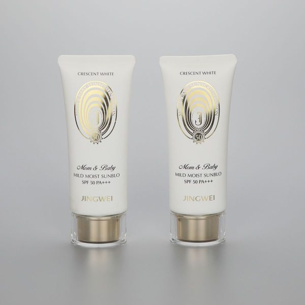 45mm Oval white 100g/3.5oz  plastic sunscreen cosmetic tube with golden pumps and acrylic cap