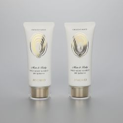 45mm Oval white 100g/3.5oz plastic sunscreen cosmetic tube with golden pumps and acrylic cap