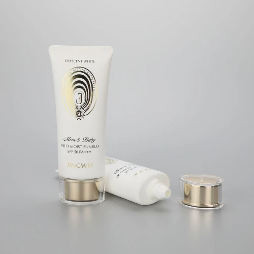 45mm Oval white 100g/3.5oz  plastic sunscreen cosmetic tube with golden pumps and acrylic cap
