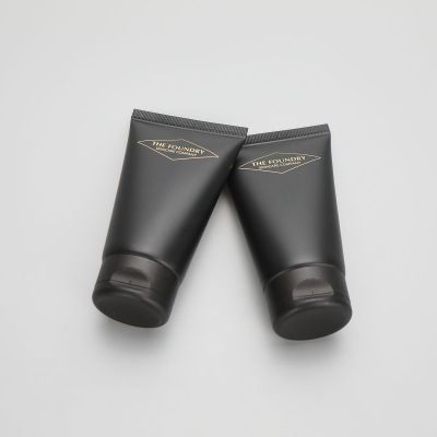 100ml matte black cosmetic plastic men facial cleanser tube with black flip top cap
