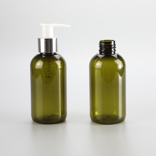 Boston round 150ml clear green short round bottle with lotion pump and a galvanized silver band