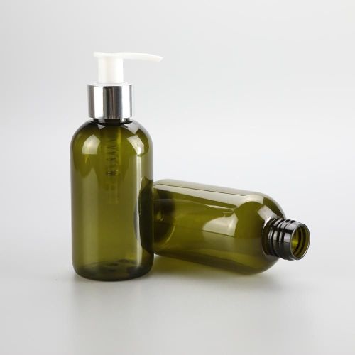 Boston round 150ml clear green short round bottle with lotion pump and a galvanized silver band