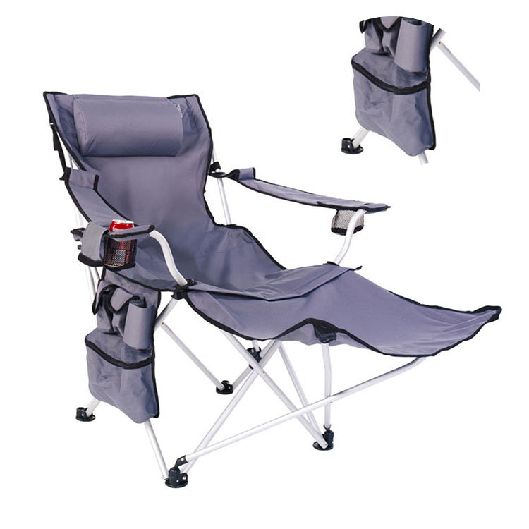A Folding Reclining Camping Chair Lounger with Footrest and Pillow