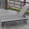 Outdoor black padded adjustable sun lounger with wheels